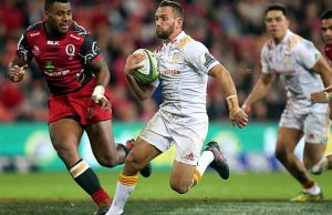 Aaron Cruden on the run for the Chiefs against the Reds