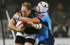 Lappies Labuschagne tackles Kyle Cooper of the Sharks