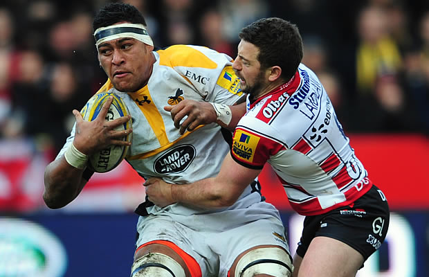 Nathan Hughes defends the ball for Wasps