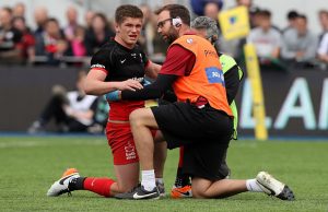 Owen Farrell gets some help from the medics