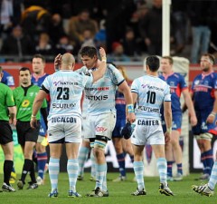 Racing Metro players celebrate victory over Grenoble