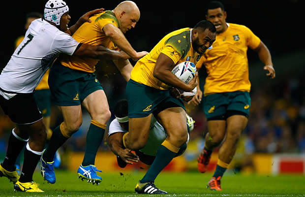 Sekope Kepu makes a break towards the tryline for Australia
