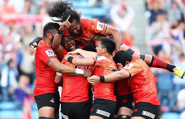 The Sunwolves celebrate victory over the Jaguares