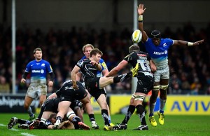 Maro Itoje charges down Will Chudley's clearance kick