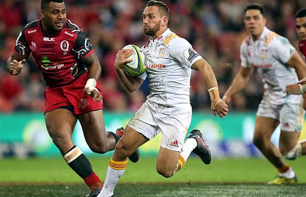 Aaron Cruden on the run for the Chiefs against the Reds