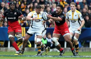 Charles Piutau defends the ball for Wasps