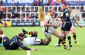 Dan Robson of Wasps drives through to score a try