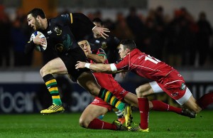 George North breaks through the defence of his former team
