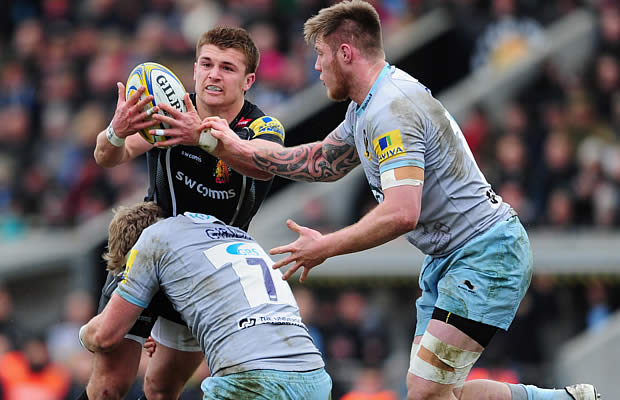 Henry Slade defends the ball for Exeter