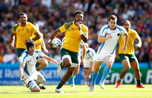 Wallaby winger Henry Speight races for the tryline against Uruguay