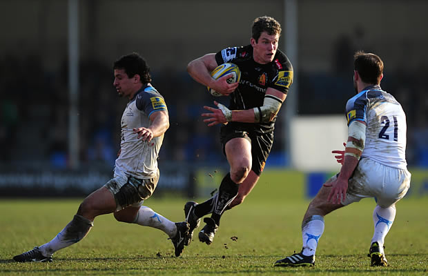 Ian Whitten is tackled by the Falcons defence