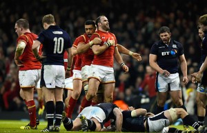 Jamie Roberts celebrates a try for Wales