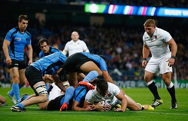 England's Nick Easter scores a try