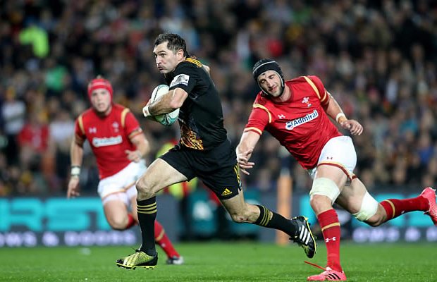 Stephen 'Beaver' Donald slips off a Wales tackle