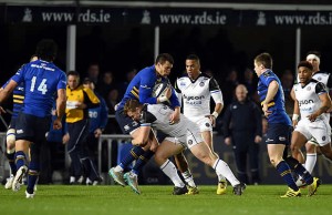 Zane Kirchner is tackled by Chris Cook of Bath